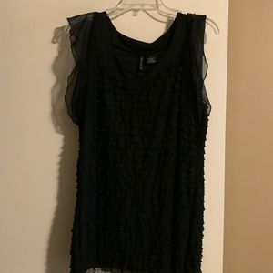 Dressy ruffled sleeve and bodice top.